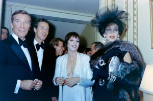 Dinner host David Mahoney, Liza Minnelli, Roy Halston, and Marisa Berenson arrive for a private dinner at Maxim's, Paris on November 26, 1973.