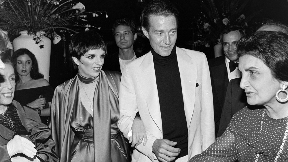 Liza Minnelli (3rd from L) and Halston (C) attend a party, benefitting the Martha Graham Center for Contemporary Dance, at Studio 54 in New York City on June 22, 1978.