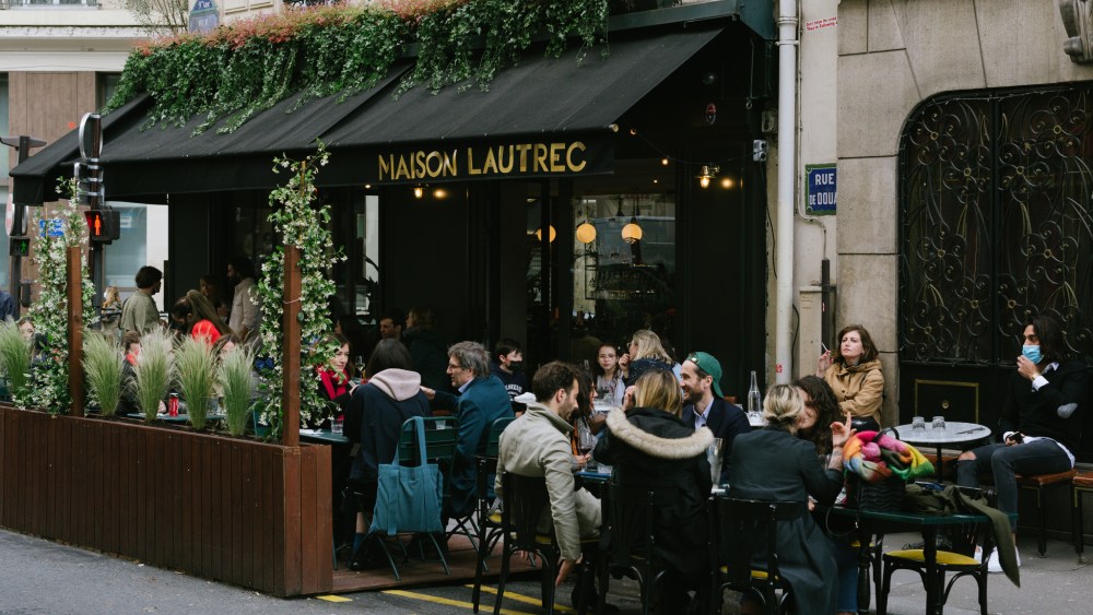 Atmosphere as Paris reopens after recent COVID-19 restrictions lift.