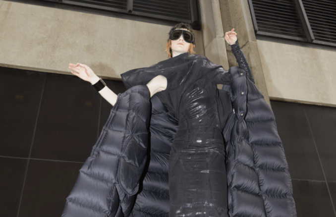 Rick Owens’ nylon coat, stretch denim dress, jersey T-shirt and cotton mask. Moncler glasses; Chanel bracelet.