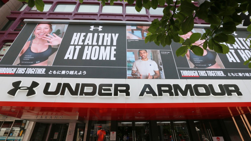 The logo of Under Armour, Inc. is seen in Shinjuku Ward, Tokyo on May 5, 2020. Under Armour is an American company that manufactures footwear, sports, and casual apparel. ( The Yomiuri Shimbun via AP Images )