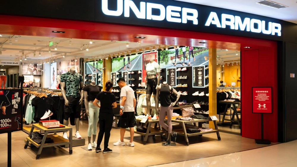 Under Armour is raising its minimum hourly wages from $10 to $15, raising pay for 8,000 workers in stores and distribution centers.