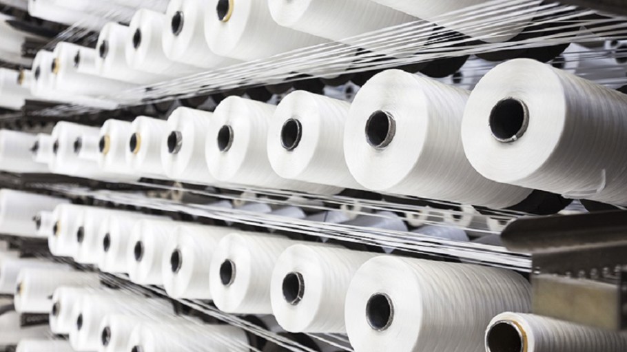 The USlTC said U.S. industry was materially injured by imports of polyester textured yarn from four Asian nations sold below fair value.