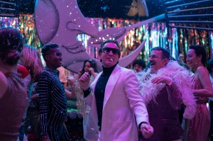 HALSTON (L to R) EWAN MCGREGOR as HALSTON, DAVID PITTU as JOE EULA, and REBECCA DAYAN as ELSA PERETTI in episode 104 of HALSTON Cr. ATSUSHI NISHIJIMA/NETFLIX © 2021