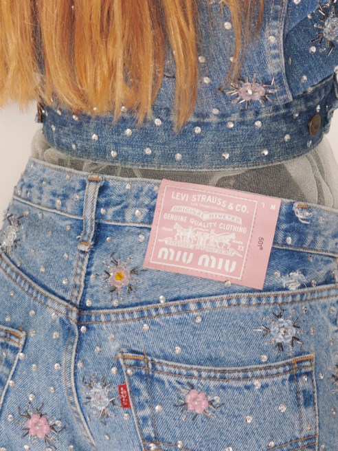 Upcycled by Miu Miu reimagines vintage Levi's jeans as one-of-a-kind statement luxury pieces.