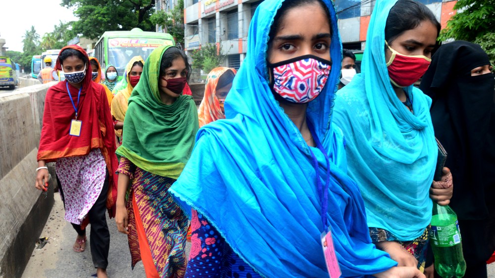 Garments workers of K Text Industrial Company Limited held a protest rally against worker harassment in their factory in Dhaka, Bangladesh, on May 21, 2021. (Photo by Mamunur Rashid/NurPhoto via AP)