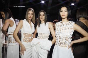 SYDNEY, AUSTRALIA - JUNE 04: (EDITORS NOTE: A special effects off-camera filter was used for this image.) Models pose backstage ahead of the Christopher Esber show during Afterpay Australian Fashion Week 2021 Resort '22 Collections at Carriageworks on June 04, 2021 in Sydney, Australia. (Photo by Hanna Lassen/Getty Images)