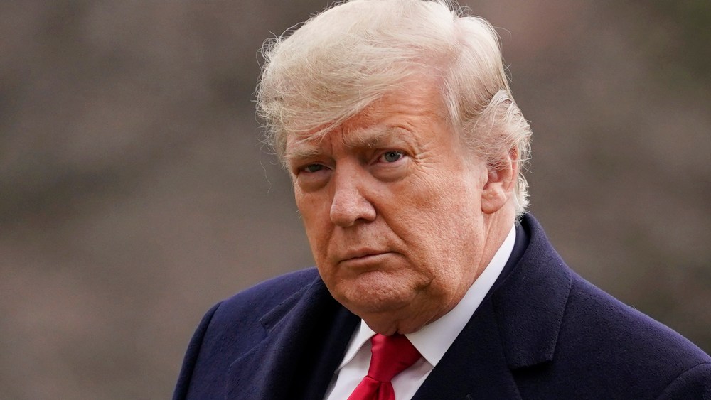 FILE - In this Dec. 31, 2020, file photo, President Donald Trump arrives on the South Lawn of the White House, in Washington.   Facebook says, on Friday, June 4,  it will suspend Trump's accounts for two years following its finding that he stoked violence ahead of the deadly Jan. 6 insurrection. Facebook also plans to end a contentious policy championed by CEO Mark Zuckerberg that automatically exempted politicians from certain moderation rules on its site. (AP Photo/Evan Vucci, File)