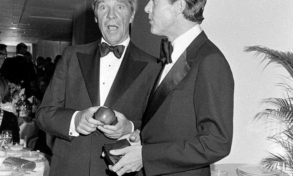 David Mahoney and Halston attend a benefit event at Bloomingdale's in New York City on September 21, 1976.