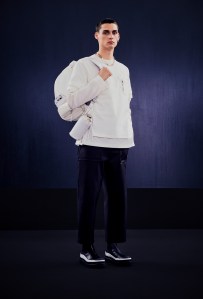 A look from Dior and Sacai's capsule collection.