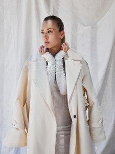 Jil Sander trenchcoat over GivenchyÕs wool dress and necklace.