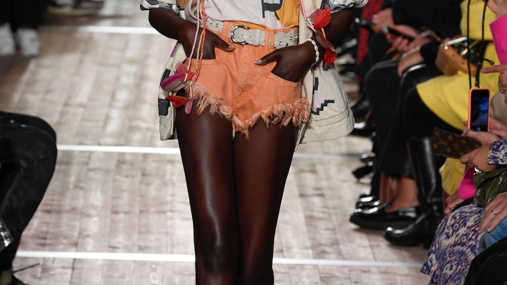 Adut Akech walks the runway in a look from the Isabel Marant Spring 2020 RTW collection.