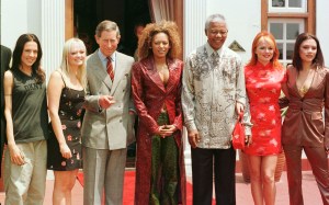 Spice Girls announcement. File photo dated 01/11/1997 of The Prince of Wales (left) and South African President Nelson Mandela with the Spice Girls (left to right), Mel C, Emma, Mel B, Geri and Victoria at the presidential residence Mahlamba Nalopfu in Pretoria, South Africa. The band is believed to be gearing up to announce a UK stadium tour for 2019 - but as a four-piece without Victoria Beckham. Issue date: Monday November 5, 2018. The Spice Girls, formed in 1994 and one of the most successful acts of that decade, have not performed together since the London Olympics closing ceremony in 2012, and they last toured together 10 years ago. See PA story SHOWBIZ Spice. Photo credit should read: John Stillwell/PA Wire URN:39527025 (Press Association via AP Images)
