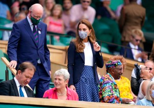The Duchess of Cambridge isolating. File photo dated 02/07/21 of the Duchess of Cambridge, Patron of the All England Lawn Tennis Club in the royal box on day five of Wimbledon at The All England Lawn Tennis and Croquet Club, Wimbledon. The Duchess of Cambridge is having to self-isolate after coming into contact with someone who later tested positive for coronavirus, Kensington Palace said. Issue date: Monday July 5, 2021. Kate was due to spend the day with William celebrating the 73rd anniversary of the NHS at two major events but will now have a 10-day period at home. See PA story ROYAL Kate. Photo credit should read: Adam Davy/PA Wire URN:60755535 (Press Association via AP Images)