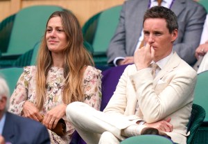 Wimbledon 2021 - Day Nine - The All England Lawn Tennis and Croquet Club. Eddie Redmayne (right) and wife Hannah Bagshawe on day nine of Wimbledon at The All England Lawn Tennis and Croquet Club, Wimbledon. Picture date: Wednesday July 7, 2021. See PA story TENNIS Wimbledon. Photo credit should read: Adam Davy/PA Wire RESTRICTIONS: Editorial use only. No commercial use without prior written consent of the AELTC. Still image use only - no moving images to emulate broadcast. No superimposing or removal of sponsor/ad logos. URN:60800108 (Press Association via AP Images)