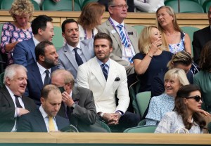 David Beckham waits for the men's singles semifinals match to begin on day eleven of the Wimbledon Tennis Championships in London, Friday, July 9, 2021. (AP Photo/Alberto Pezzali)