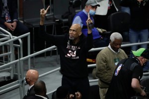 Kareem Abdul-Jabbar reacts during the first half of Game 4 of basketball's NBA Finals between the Milwaukee Bucks and the Phoenix Suns, Wednesday, July 14, 2021, in Milwaukee. (AP Photo/Aaron Gash)