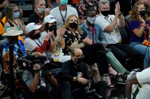 Musician Adele, center, watches during the first half of Game 5 of basketball's NBA Finals between the Phoenix Suns and the Milwaukee Bucks, Saturday, July 17, 2021, in Phoenix. (AP Photo/Ross D. Franklin)