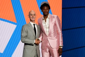 Kai Jones poses for a photo with NBA Commissioner Adam Silver after being selected as the 19th overall pick by the New York Knicks during the NBA basketball draft, Thursday, July 29, 2021, in New York. (AP Photo/Corey Sipkin)