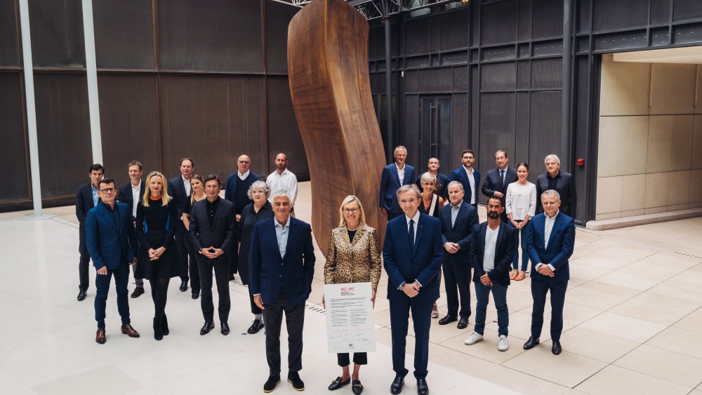 Bernard Arnault and LVMH executives at the Worldwide Engagements for Métiers d’Excellence signing ceremony.