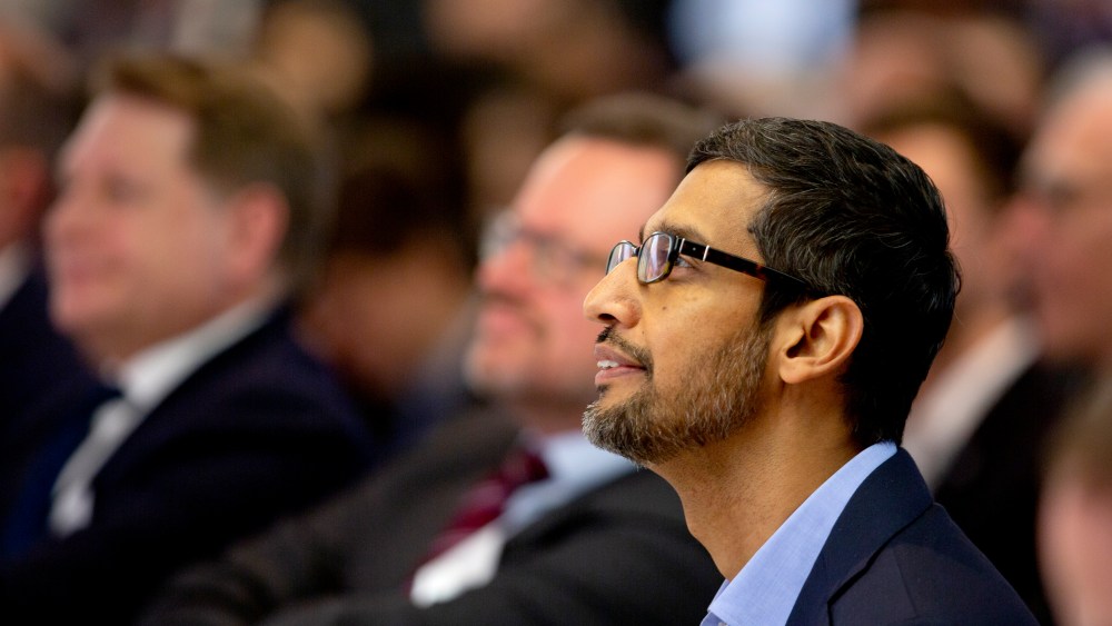 Google's chief executive Sundar Pichai waits to address the audience during an event on artificial intelligence at the Square in Brussels, Monday, Jan. 20, 2020. Google's chief executive called Monday for a balanced approach to regulating artificial intelligence, telling a European audience that the technology brings benefits but also negative consequences. (AP Photo/Virginia Mayo)