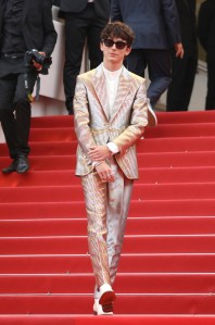 Timothee Chalamet poses for photographers upon arrival at the premiere of the film 'The French Dispatch' at the 74th international film festival, Cannes, southern France, Monday, July 12, 2021. (Photo by Vianney Le Caer/Invision/AP)