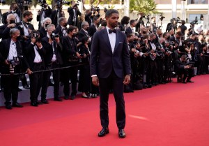 Kingsley Ben-Adir poses for photographers upon arrival at the premiere of the film 'Benedetta' at the 74th international film festival, Cannes, southern France, Friday, July 9, 2021. (AP Photo/Brynn Anderson)