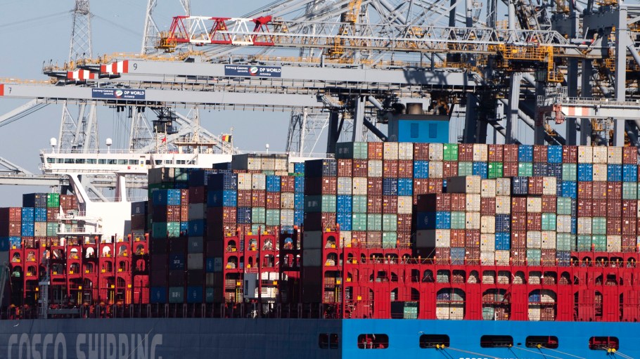 Shipping containers are offloaded from a vessel in the Port of Antwerp, Belgium.