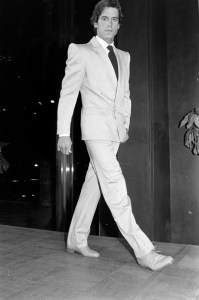A model poses in Pierre Cardin's double-breasted suit with pagoda shoulders during the French menswear designer fashion show in New York on October 8, 1979.