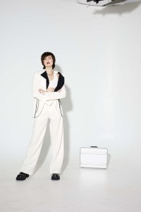 Ashlyn’s wool gabardine suit, Aya Muse’s viscose and nylon bralette. Eytys boots; IceLink watch; Sophie Bille Brahe pearl necklace; Pattaraphan necklace; Other People’s Property necklace and rings; Mam rings.