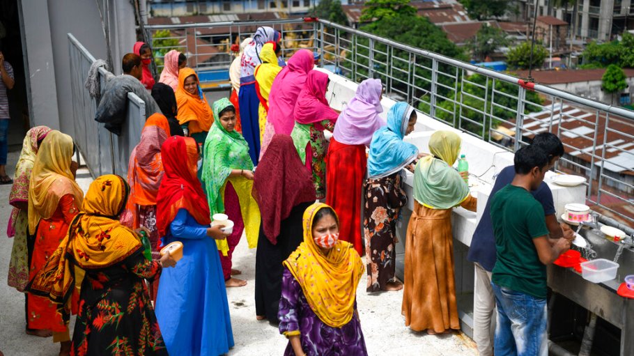 Garment workers taking precautions in Dhaka, Bangladesh - 17 Aug 2021