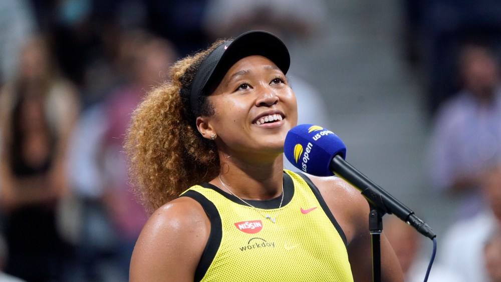 Naomi Osaka, of Japan, speaks to the crowd after beating Marie Bouzkova, of the Czech Republic, during the first round of the US Open tennis championships, Monday, Aug. 30, 2021, in New York. (AP Photo/Elise Amendola)