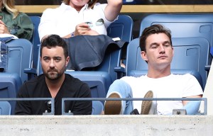 Tyler Cameron watches the Men's Singles semifinal match between Felix Auger-Aliassime and Daniil Medvedev at the 2021 US Open, Friday, Sep. 10, 2021 in Flushing, NY. (Allison Joseph/USTA via AP)