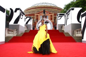 Lashana Lynch poses for photographers upon arrival for the World premiere of the film 'No Time To Die', in London Tuesday, Sept. 28, 2021. (Photo by Joel C Ryan/Invision/AP)