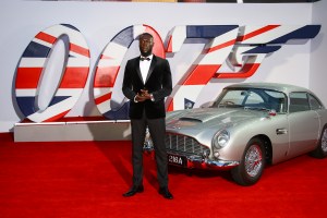 Stormzy poses for photographers upon arrival for the World premiere of the new film from the James Bond franchise 'No Time To Die', in London Tuesday, Sept. 28, 2021. (Photo by Joel C Ryan/Invision/AP)