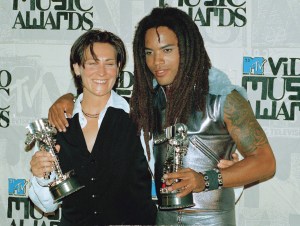 Lenny Kravitz, right, and k.d. lang hold their awards for best male video and best feamle video during the 10th Annual MTV Video Music Awards Sept. 2, 1993, in Universal City, Calif.  Kravitz won for "Are You Gonna Go My Way" and lang won for "Constant Craving."  (AP Photo/Mark J. Terrill)