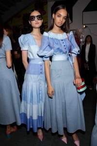 Models backstage in looks from Carolina Herrera's Spring 2018 ready to wear collection.