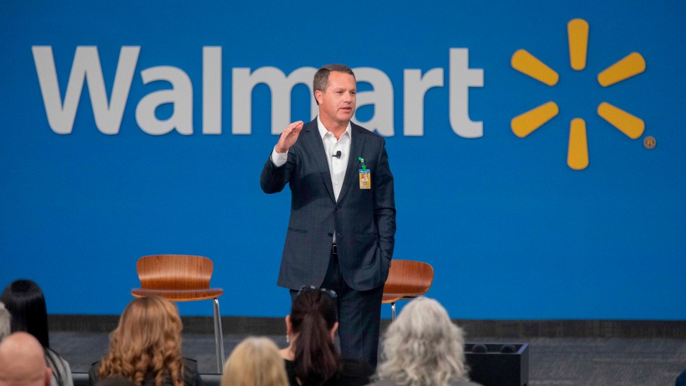 IMAGE DISTRIBUTED FOR WALMART - Walmart President and CEO, Doug McMillon, announced today that Walmart will give hiring preference to military spouses, becoming the largest U.S. company to make such a commitment. This announcement came during a Veterans Day ceremony on Monday, Nov. 12, 2018 in Bentonville, Ark. (Gareth Patterson/AP Images for Walmart)