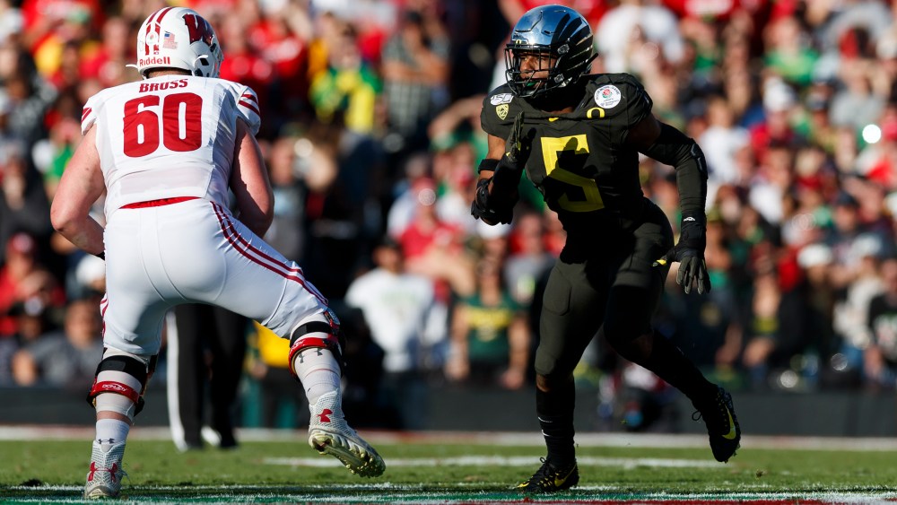 Oregon defensive end Kayvon Thibodeaux (5) rushes the edge during the Rose Bowl NCAA college football game against the Wisconsin Badgers, Wednesday, Jan. 1, 2020, in Pasadena, Calif. (Ryan Kang via AP)