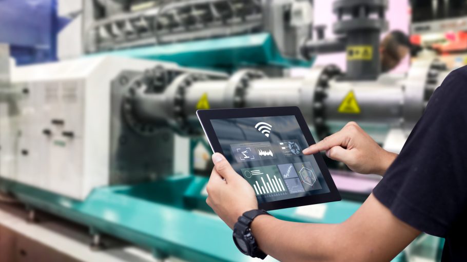 The flexible factory model utilizes digital instruction screens to streamline the construction process of garments.