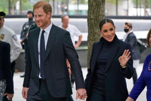 Meghan Markle waves as she and her her husband Prince Harry leave the National September 11 Memorial & Museum in New York, Thursday, Sept. 23, 2021. The Duke and Duchess of Sussex got a hawk's-eye view of New York City with a visit to the rebuilt World Trade Center's signature tower. (AP Photo/Seth Wenig)