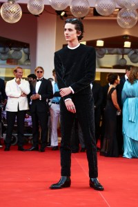 Timothee Chalamet poses for photographers upon arrival at the premiere of the film 'Dune' during the 78th edition of the Venice Film Festival in Venice, Italy, Friday, Sep, 3, 2021. (Photo by Joel C Ryan/Invision/AP)