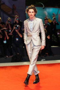 Actor Timothee Chalamet poses for photographers upon arrival at the premiere of the film 'The King' at the 76th edition of the Venice Film Festival, Venice, Italy, Monday, Sept. 2, 2019. (Photo by Arthur Mola/Invision/AP)