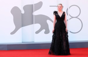 6641222 02.09.2021 American actress Kirsten Dunst poses for photos on the red carpet ahead the premiere of the film directed by Jane Campion "The Power of the Dog" as part of the 78th Venice International Film Festival, in Lido, Italy. Ekaterina Chesnokova / Sputnik  via AP