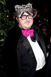 Designer Alber Elbaz wearing a bejeweled cat mask attends Allison Sarofim's annual Halloween Party in New York on October 31, 2010.