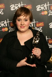Adele poses at a photocall for the 2008 Brit Awards in London, Dec. 11, 2007. (AP Photo/John Marshall, JME)
