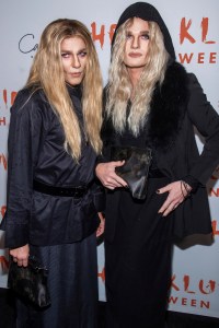David Burtka, left, and Neil Patrick Harris attend Heidi Klum's Halloween party dressed respectively as Ashley Olsen and Mary-Kate Olsen, at Cathedrale on Thursday, Oct. 31, 2019, in New York. (Photo by Charles Sykes/Invision/AP)
