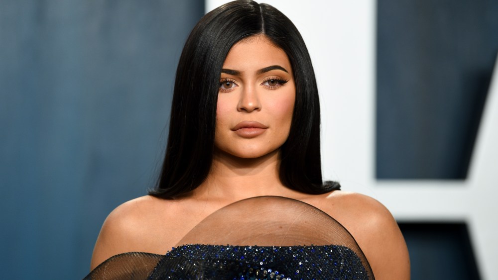FILE - In this Feb. 9, 2020 file photo, Kylie Jenner arrives at the Vanity Fair Oscar Party in Beverly Hills, Calif. Forbes magazine, which once declared Jenner a billionaire on its cover, says she no longer deserves the title if she ever did, but Jenner is pushing back. Forbes said in a story posted Friday that an examination of financial filings after the reality star and beauty mogul sold 51% of her company Kylie Cosmetics to Coty in a January deal valued at $1.2 billion reveal that Jenner’s worth was inflated. (Photo by Evan Agostini/Invision/AP, File)