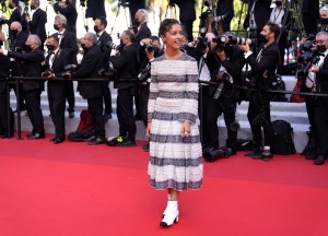 Lyna Khoudri poses for photographers upon arrival at the awards ceremony and premiere of the closing film 'OSS 117: From Africa with Love' at the 74th international film festival, Cannes, southern France, Saturday, July 17, 2021. (AP Photo/Brynn Anderson)