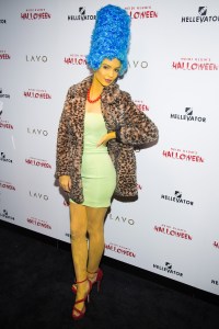 Emily Ratajkowski dressed as Marge Simpson attends Heidi's 16th Annual Halloween Party at Lavo on Saturday, Oct. 31, 2015, in New York. (Photo by Charles Sykes/Invision/AP)